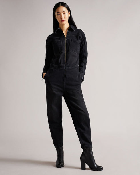 ALEYAH-Trousers-Get your wardrobe jumping for joy with the addition of ALEYAH. Bringing a statement for all seasons, this denim jumpsuit zips up at the front allowing for the ultimate cover-up or a slightly more revealing statement depending on your event. Pair with chunky boots for a more dressed up look, or match with simple trainers and a plain t-shirt for a casual day vibe. The fabric of this product contains organic cotton. Organic cotton has a proven lower environmental impact than conventional cotton